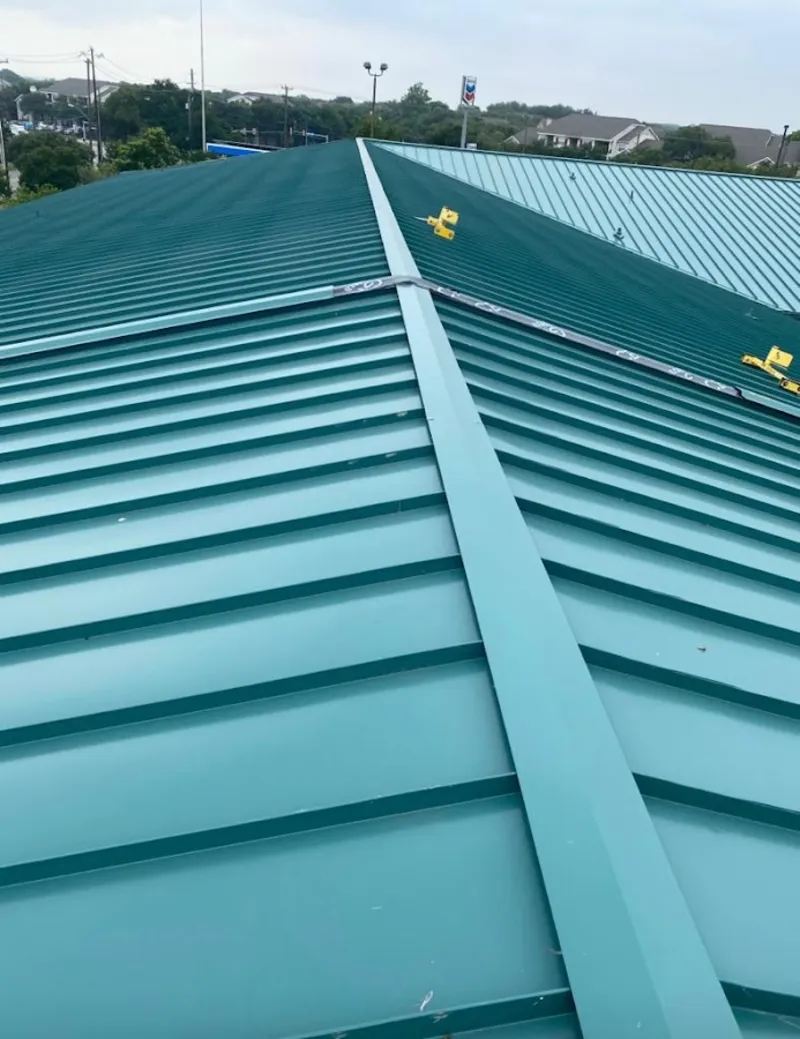 Green commercial metal roof ridge and valley for Metal Roof Repair in Delhi Hills